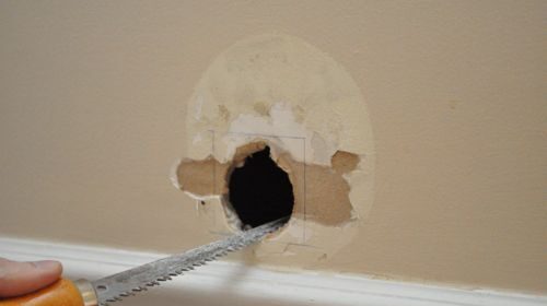 How to Patch a Hole in Your Drywall | The Art of Manliness small exterior fuse box 