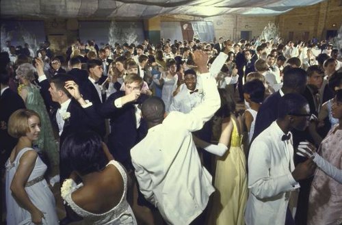 Vintage schoolers enjoying dancing in school. 