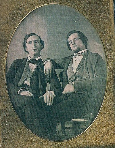 Vintage two men are siting wearing suites black and white photo illustration.