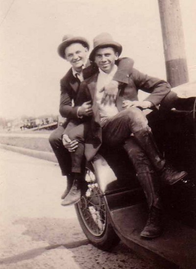 Vintage two young men sitting on vehicle black and white illustration.