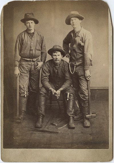 Vintage three young men wearing hats black and white illustration.