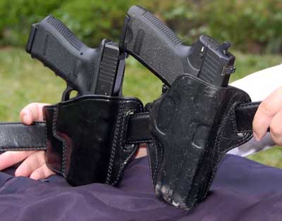 Handguns in holster concealed carry style choices. 