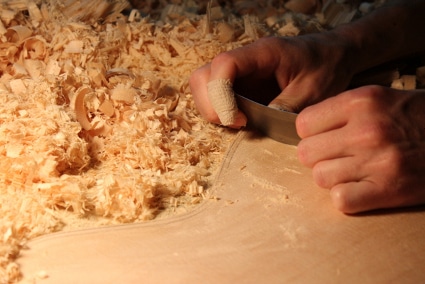 Scratching surface of guitar.