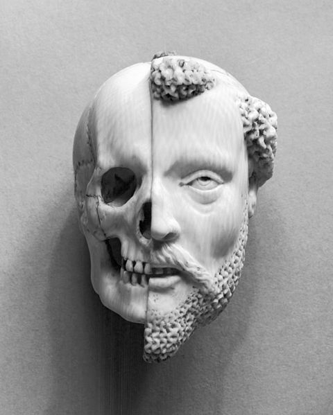 16th/17th century ivory pendant: Monk and Death.