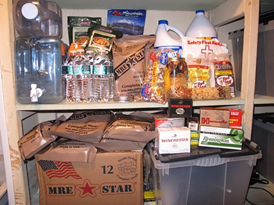 A shelf stocked with essentials for surviving a grid-down disaster, including food and other items.