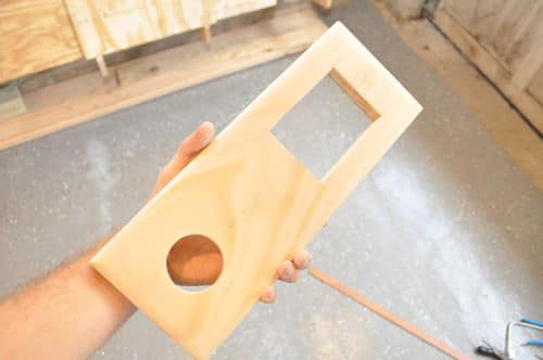 DIY of drilled holes in wooden cribbage board.