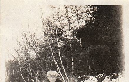 A man snowshoeing in the frozen water.