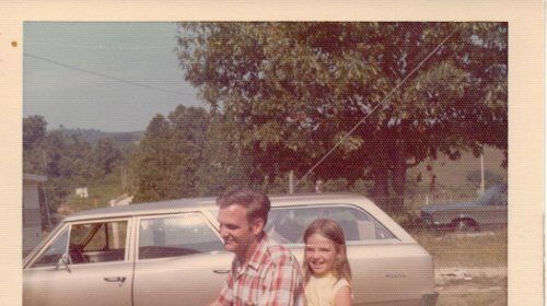 An awesome uncle and a girl on a motorcycle.