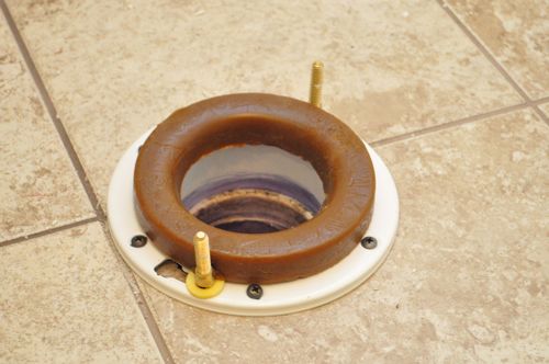  New toilet wax ring on flange installed. 