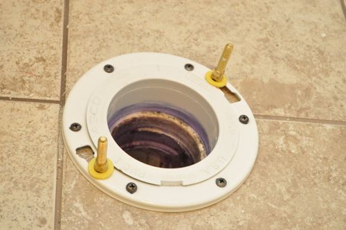 How to install a new toilet positioning closet bolts. 