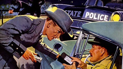 A police officer is talking to a man who was pulled over.