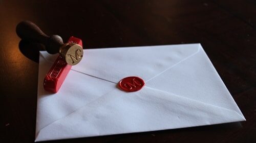A historical envelope with a wax seal.