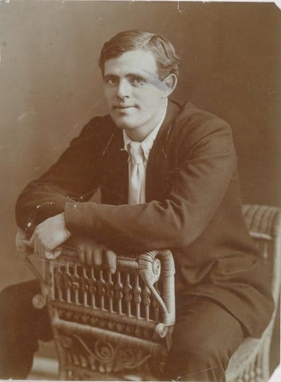 Jack London portrait sitting posing on chair.