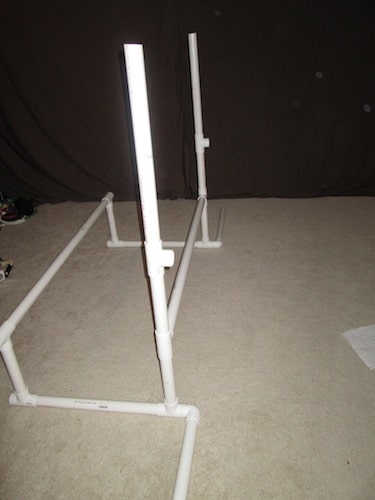 Step 6: Insert two T sections and two 2 foot pipes on top of the 1 foot pipes.
