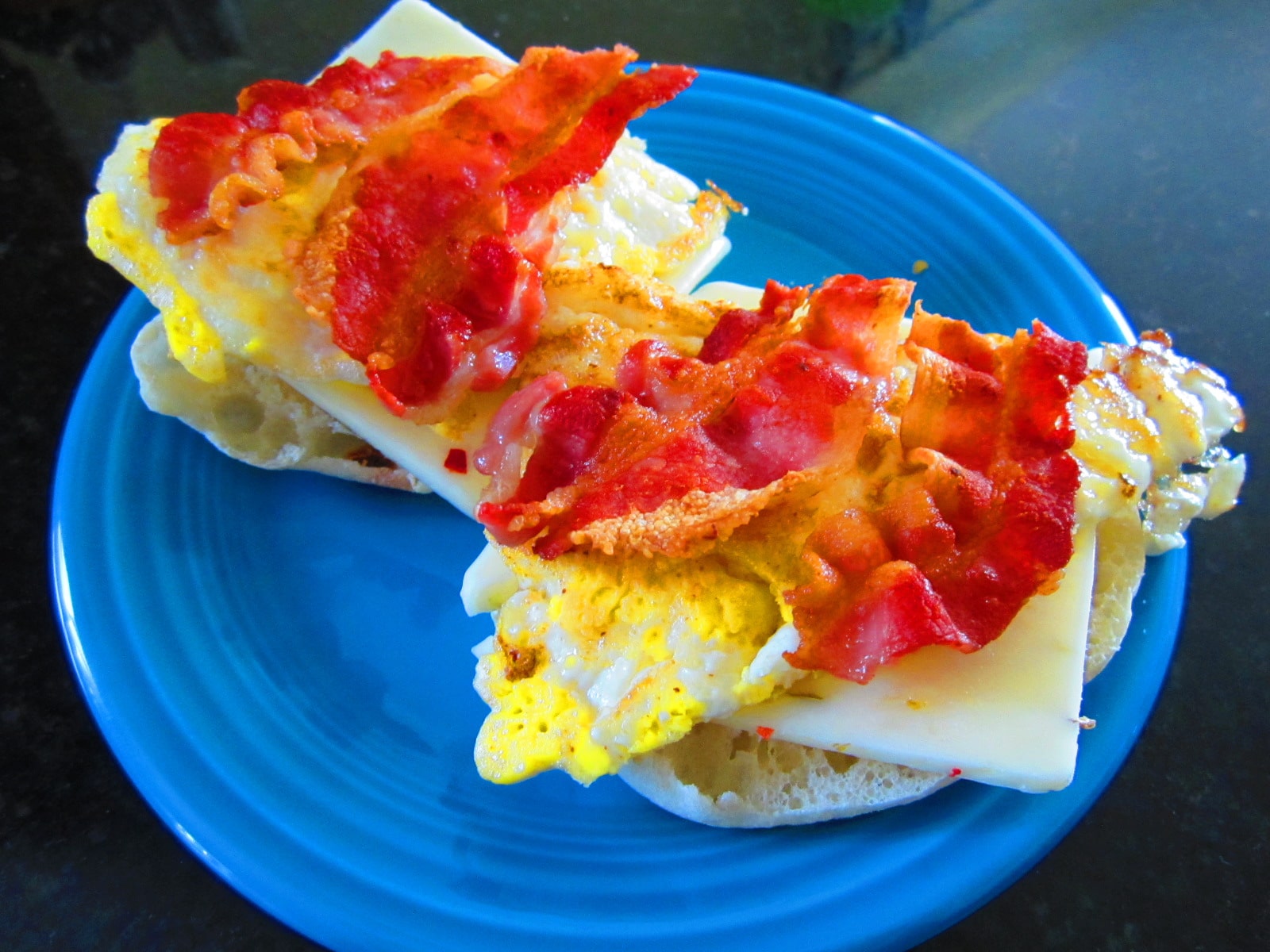 Vintage split both bacon strips in half and gave one strip to each sandwich.