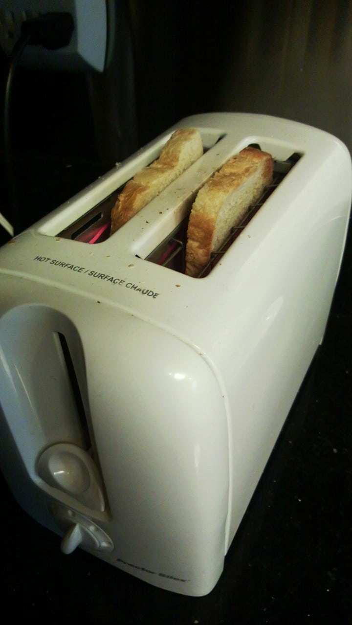 Vintage toast bread into oven.