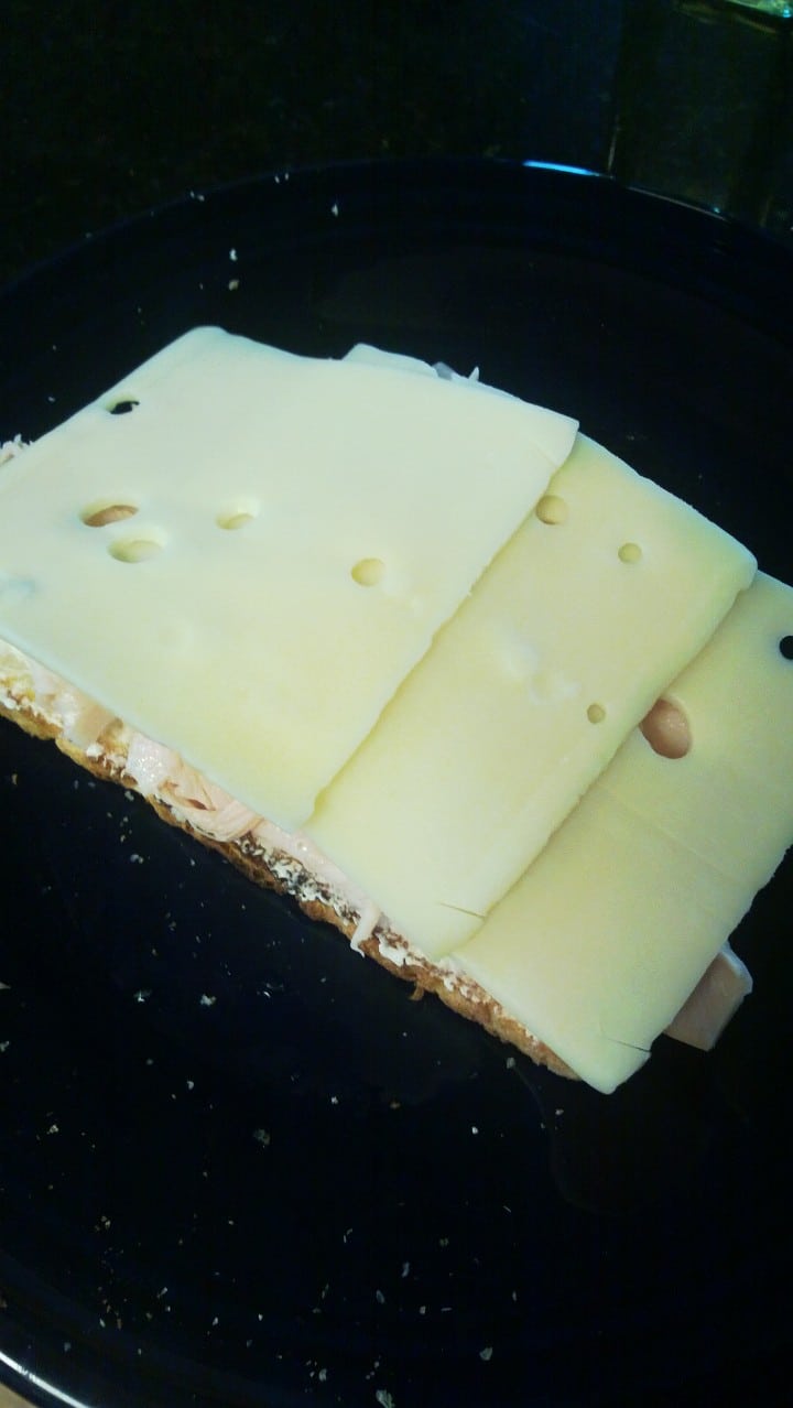 Vintage swiss cheese on a bread.