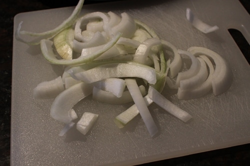 Vintage chop up a white onion.