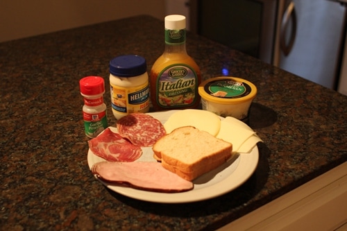Vintage ingredients for three cheese Italian sandwich.