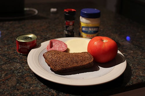 Vintage rye bread, butter, salami Ingredients.