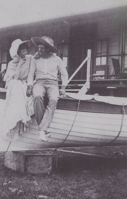 jack london and charmian sitting on yacht