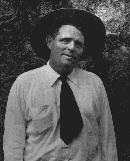 Vintage man smiling and wearing hat.