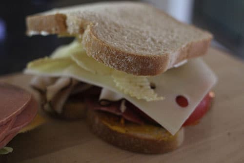 Vintage mayo smeared slice of bread on top of the Chips.