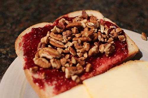 Vintage chopped pecans on a bread.