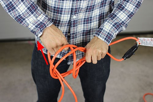 Wrap extension cord pull strands through slip knots.