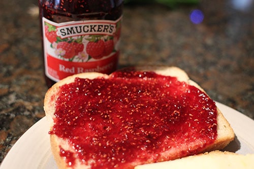 Vintage raspberry jam on a bread.