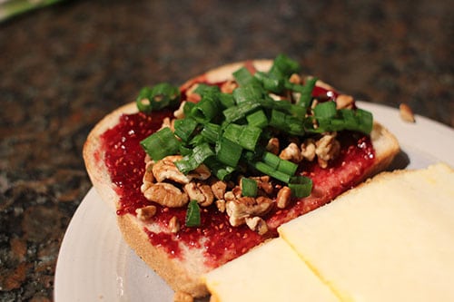 Vintage chopped green onion on a bread.