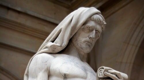 A statue of Cato, a self-made man holding a sword, serving as a symbol of valuable lessons.