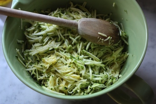 Shredded zucchini into thin strips.