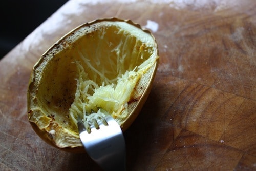 Baked spaghetti squash with fork.