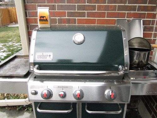 Weber grill with home coffee roasting supplies. 