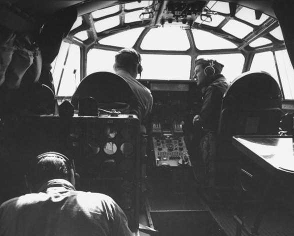 Vintage airplane cockpit by military aircraft.