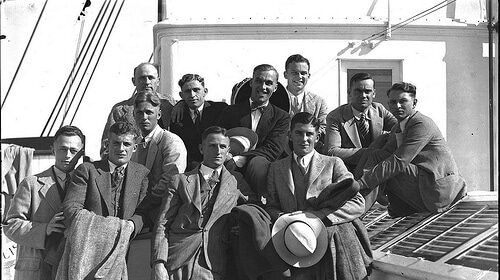 A lifelong brotherhood creating memories, posing on a boat.