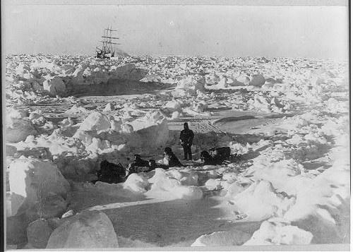 Shackleton Antarctic expedition men exploring ice away from ship.