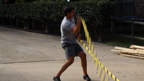 Vintage man moving his double arm for uppercuts.