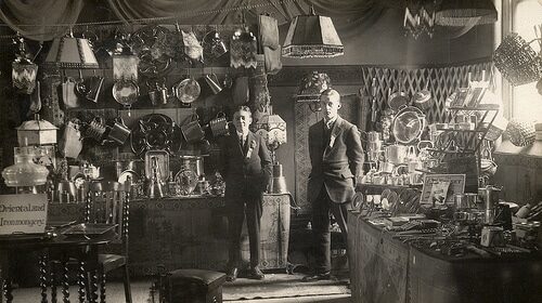 Two men consider starting a business in an invaluable shop.