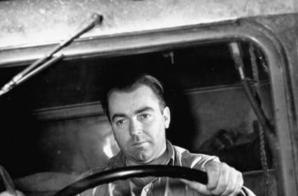 A mundane man finding meaning in the driver's seat of a truck.