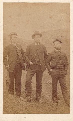 Vintage 1800s men three guys posing outdoors.