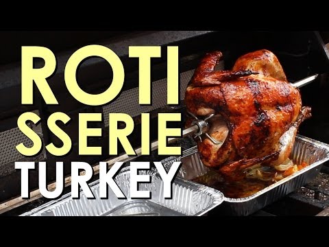Thanksgiving turkey cooked on a rotisserie grill.