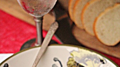 A plate of pasta on a table, accompanied by venison and served with delicious recipes and cooking tips.