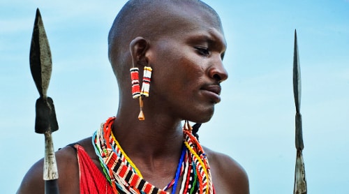 Masai young boy with spear hunting gear.