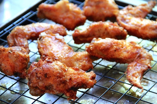 Fried chicken on grill.