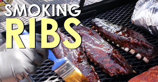 Grilling baby back ribs with a smoky flavor.