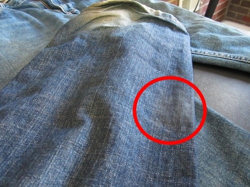 Wax seen on light pair of jeans.
