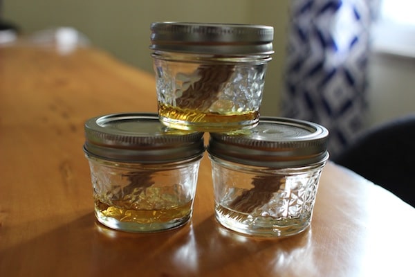 Diy flavored toothpicks marinating in jars.