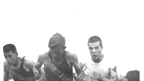 Men responding to the challenge of stress by running on a track.